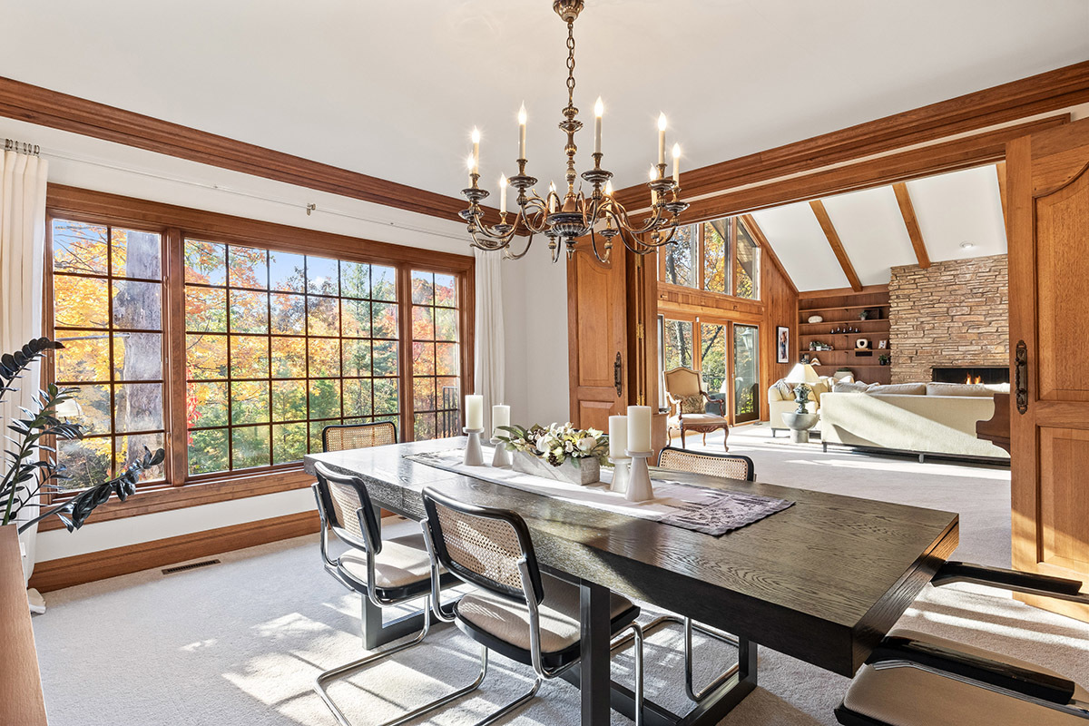 1931 Camphill Circle Inverness, IL 60067 - Photo 10 of 55 a view of a dining room with furniture large windows and wooden floor