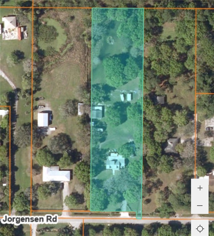 4761 Jorgensen Road Fort Pierce, FL 34981 - Photo 26 of 26 an aerial view of a residential houses with outdoor space and street view
