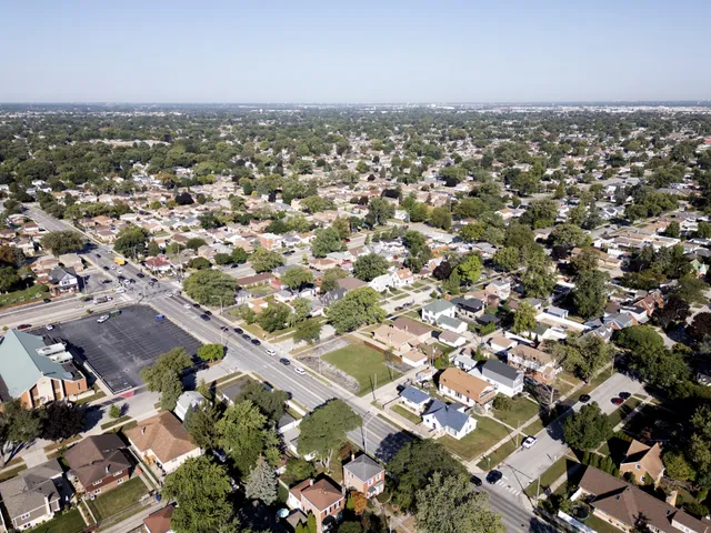 an aerial view of a city with lots of residential buildings