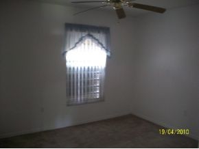 1320 Southeast Ran Palm Bay, FL 32909 - Photo 6 of 8 en empty room with windows