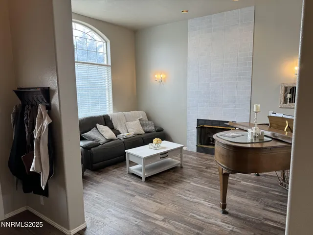 a living room with furniture and a table