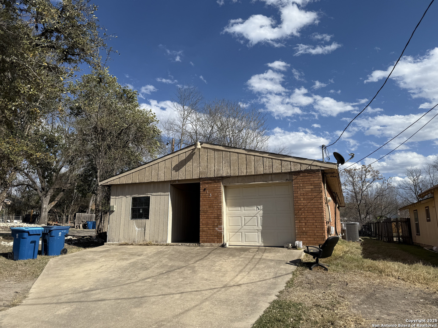 813 Ross Street Kerrville, TX 78028 - Photo 3 of 12 a front view of a house with a yard