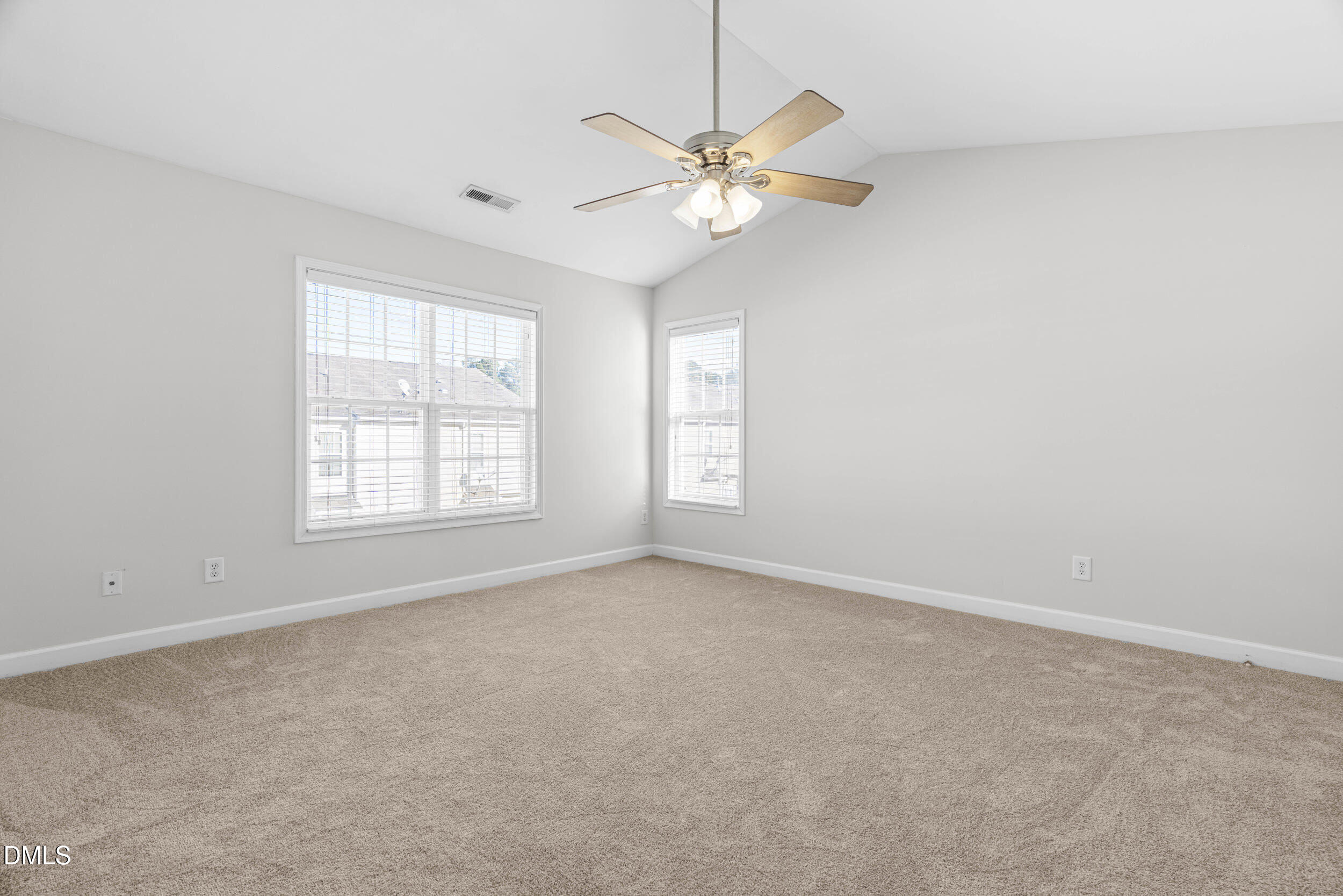 8320 Boca Point Raleigh, NC 27616 - Photo 20 of 28 an empty room with windows and fan