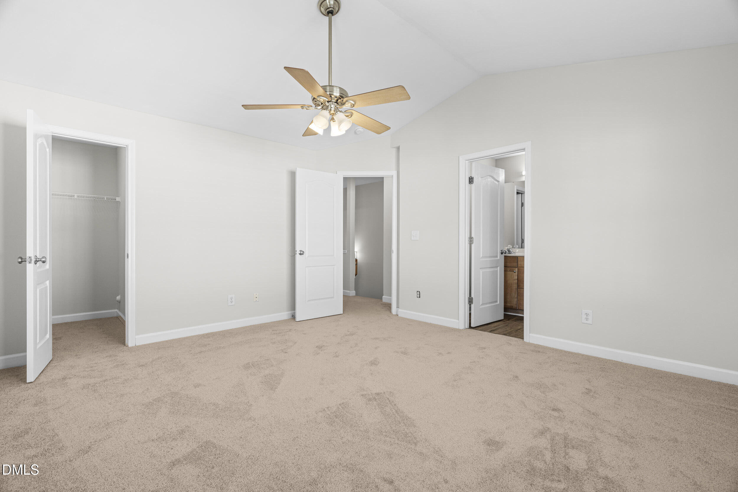 8320 Boca Point Raleigh, NC 27616 - Photo 21 of 28 an empty room with a chandelier fan and closet