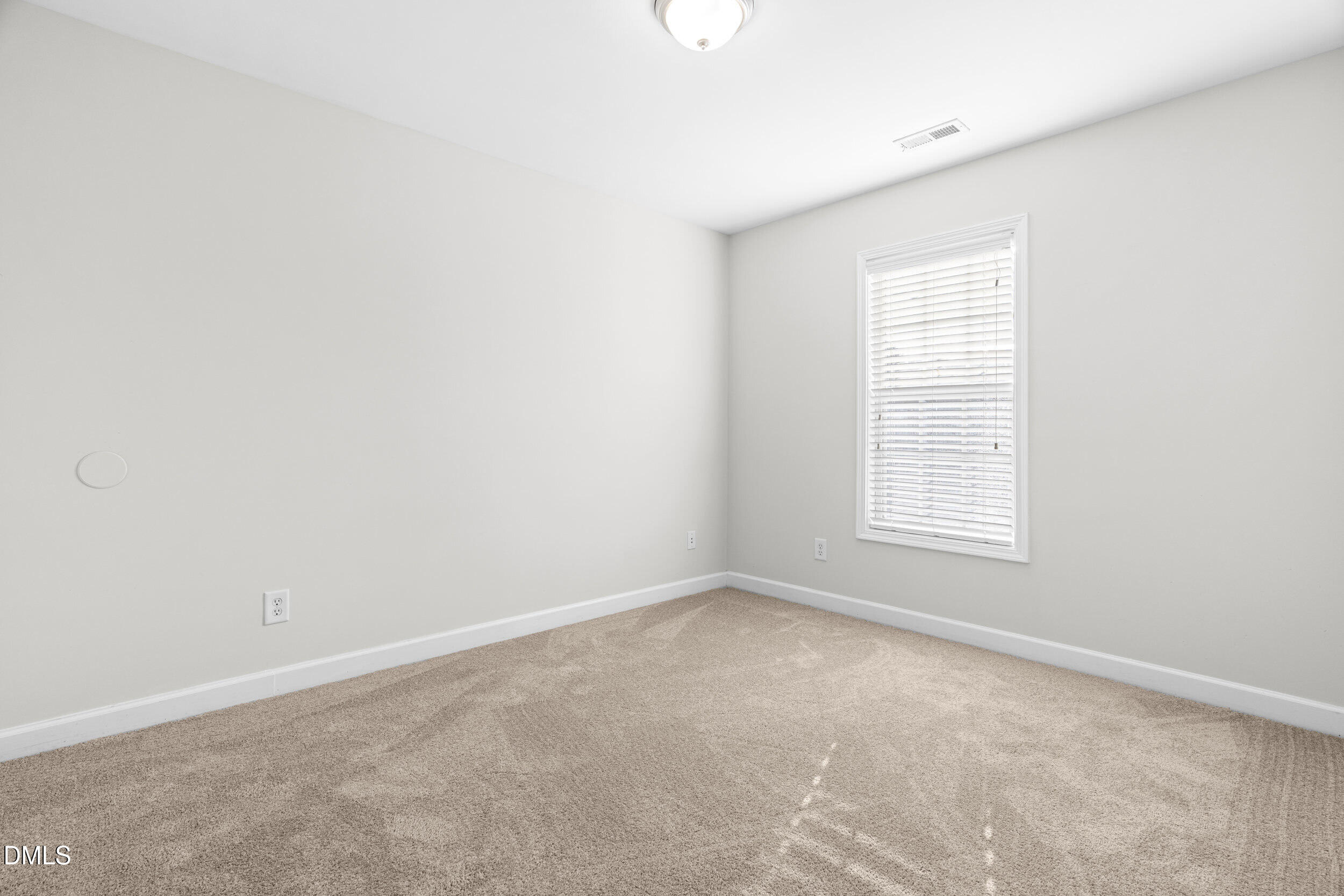 8320 Boca Point Raleigh, NC 27616 - Photo 23 of 28 an empty room with a window