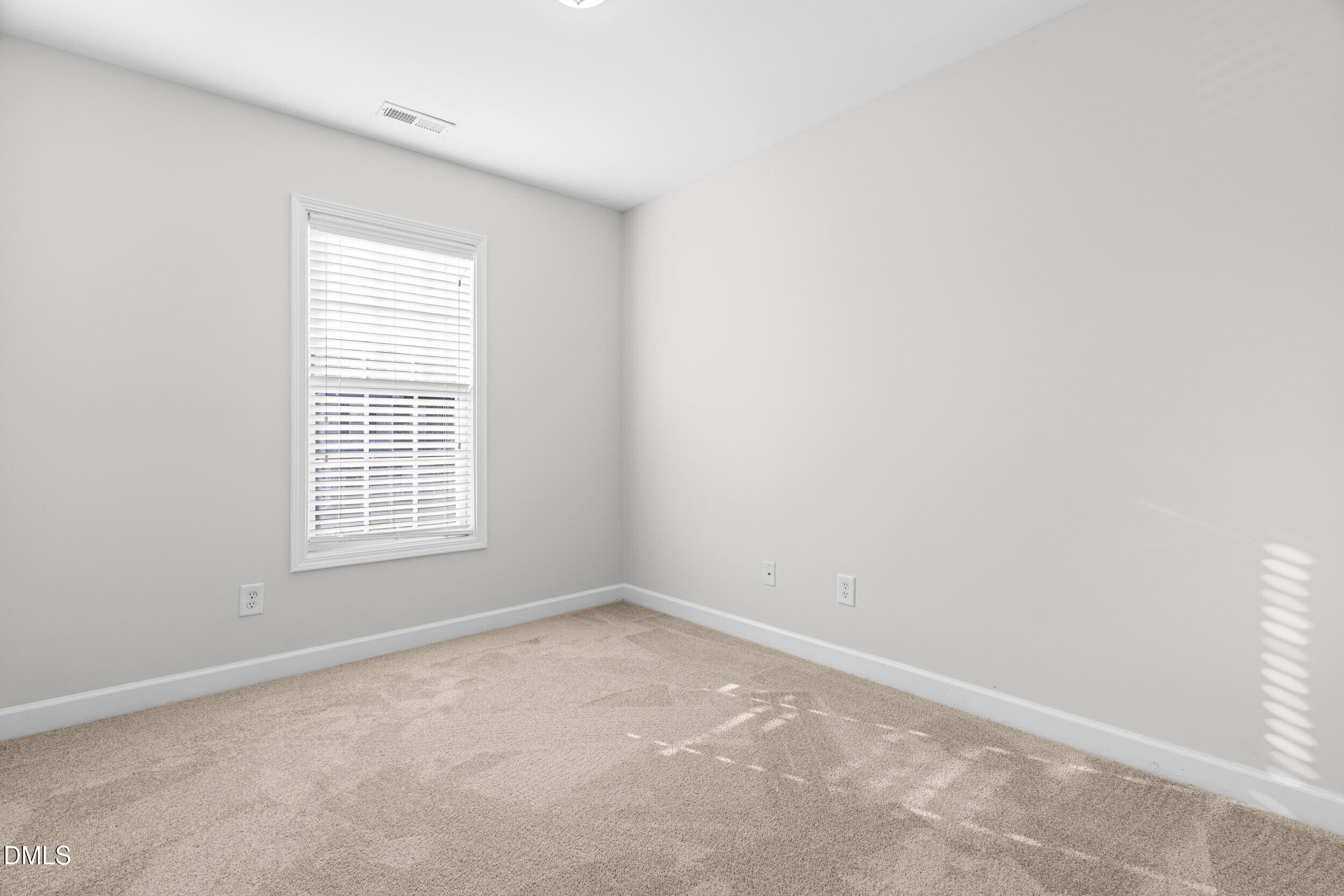 8320 Boca Point Raleigh, NC 27616 - Photo 24 of 28 an empty room with a window