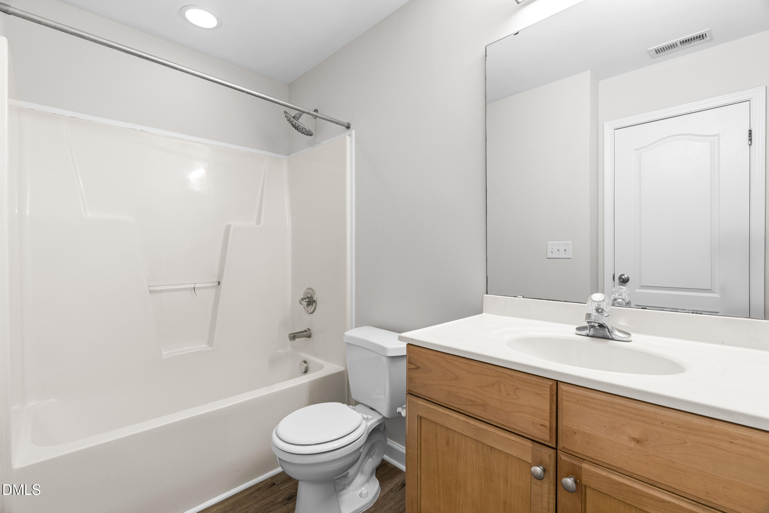 8320 Boca Point Raleigh, NC 27616 - Photo 25 of 28 a bathroom with a sink toilet and shower
