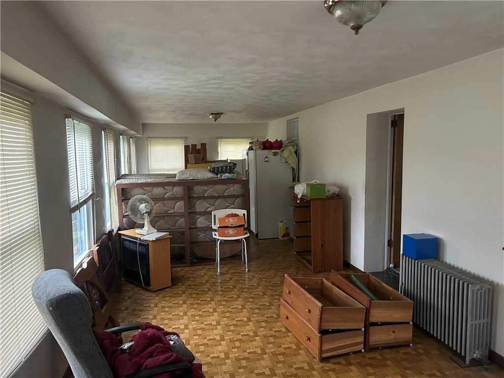 3022 Richey Road Connellsville, PA 15425 - Photo 5 of 18 a living room with furniture rug and wooden floor
