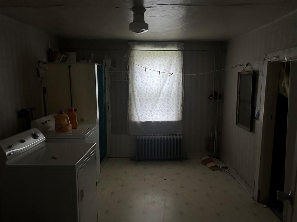 3022 Richey Road Connellsville, PA 15425 - Photo 6 of 18 a room with black door and a window