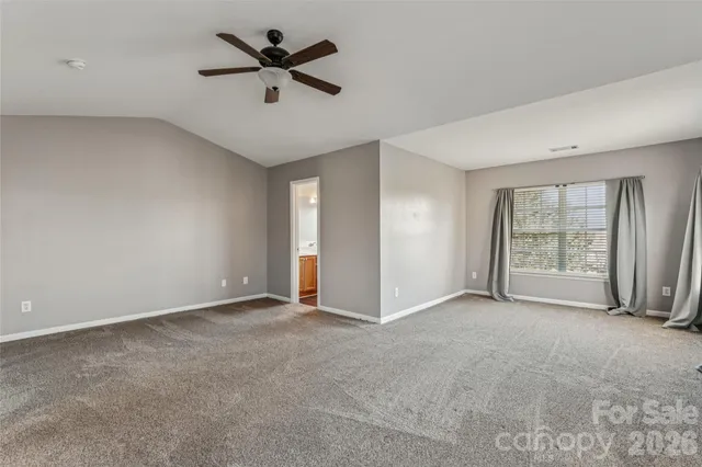 a view of room with ceiling fan