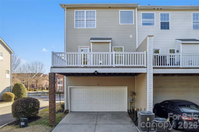 an aerial view of a house with outdoor space