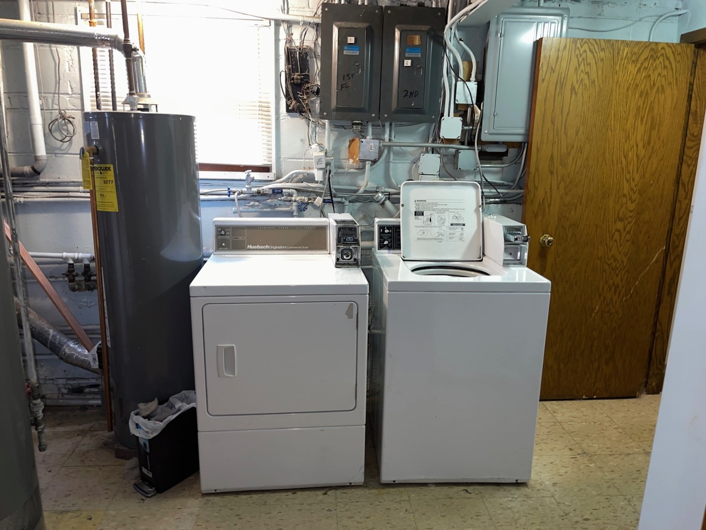 6614 West Devon Avenue Chicago, IL 60631 - Photo 18 of 21 a utility room with dryer and washer