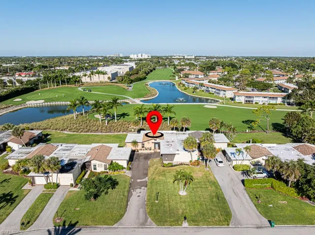 an aerial view of a pool patio swimming pool and outdoor seating