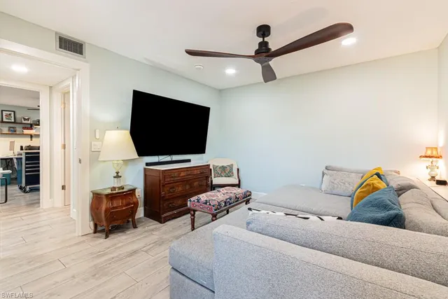 a view of a workspace with furniture