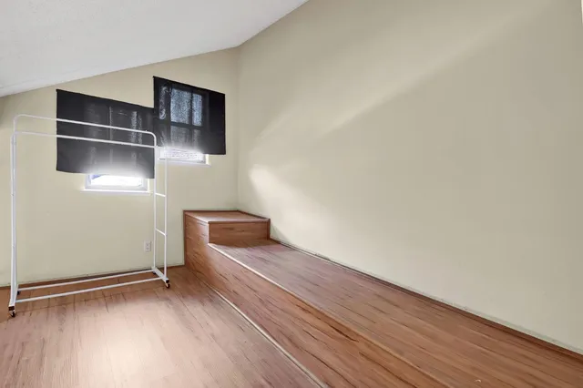 a view of outdoor space with wooden floor