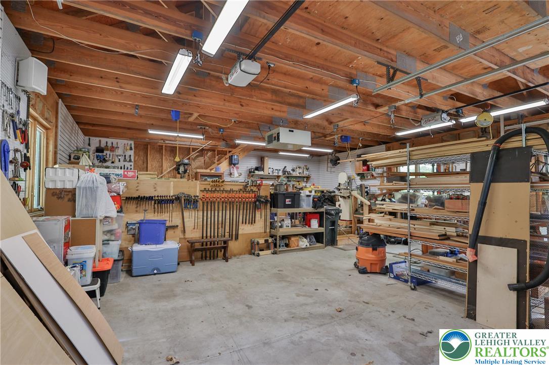 2159 Quarry Road Coopersburg, PA 18036 - Photo 55 of 79 Detached 2 bay heated garage with workshop area. Shop includes an air filtration system and vacuum. All other shop equipment is for sale but NOT included in the purchase price