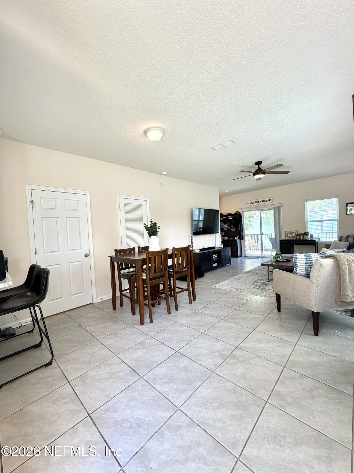 845 Observatory Parkway Jacksonville, FL 32218 - Photo 26 of 42 a living room with furniture and kitchen view