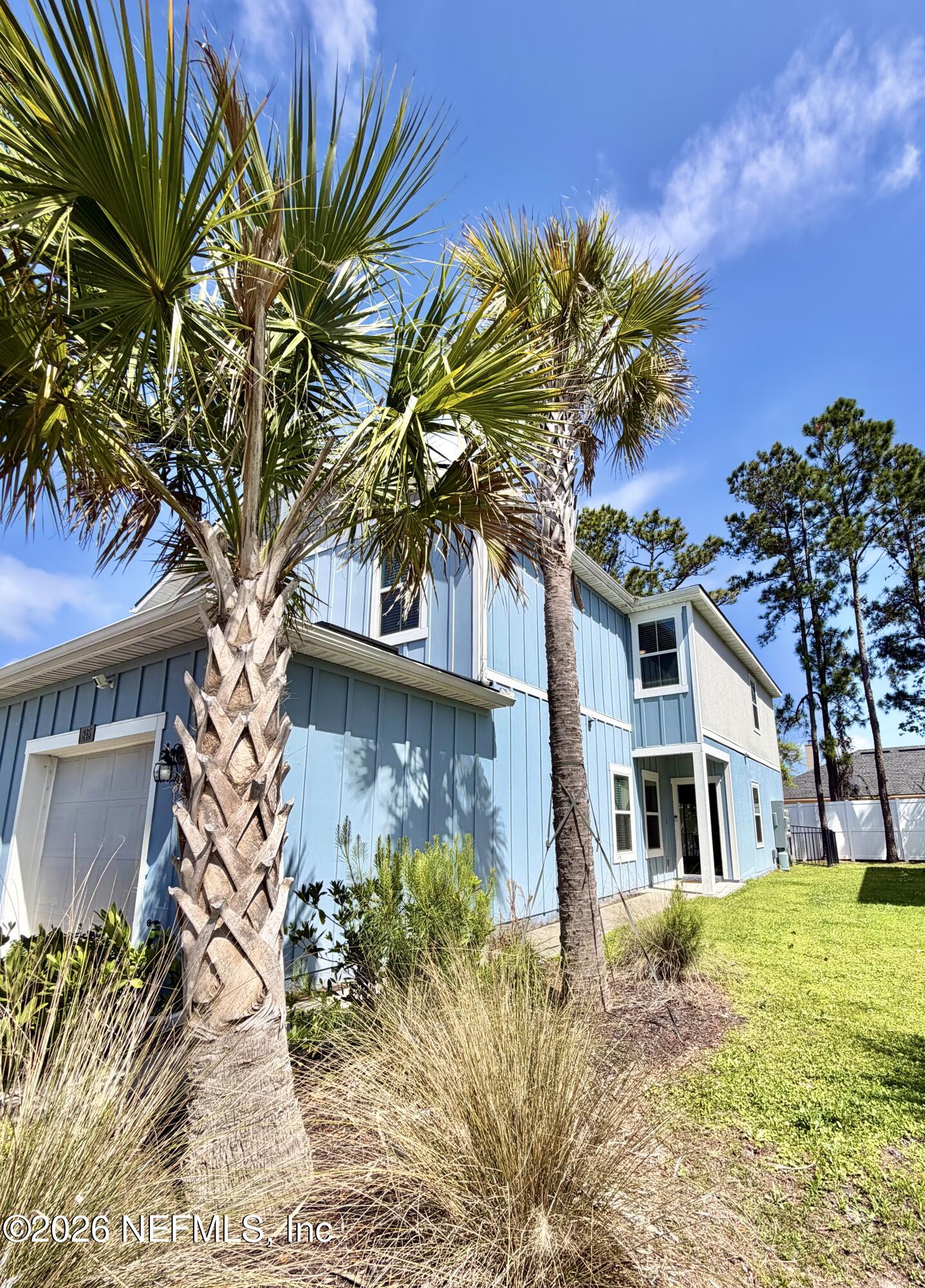 845 Observatory Parkway Jacksonville, FL 32218 - Photo 37 of 42 a front view of a house with a garden