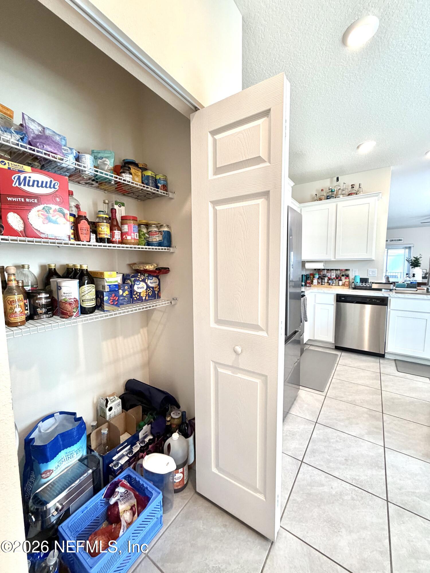 845 Observatory Parkway Jacksonville, FL 32218 - Photo 42 of 42 a kitchen with stainless steel appliances cabinets and a counter top space