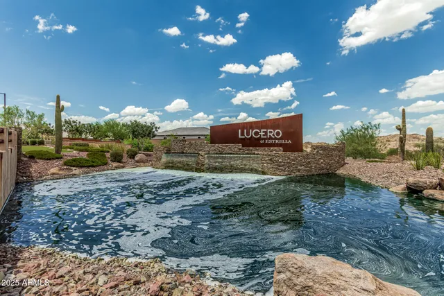 a view of a big yard and a fountain