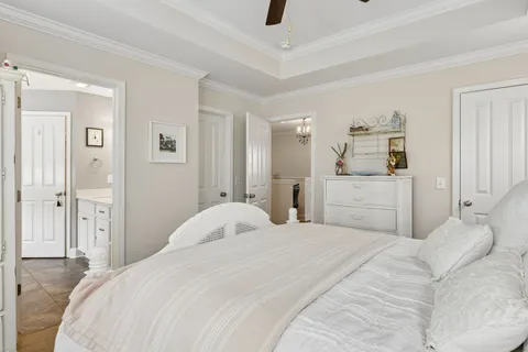 a bedroom with a bed and a cabinets