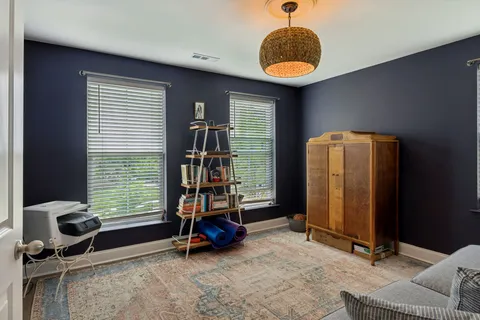 a room with furniture and a window
