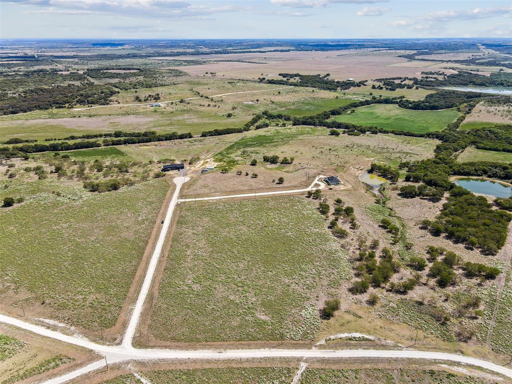 450 Private Road 453 Road, Unit LOT 12 Grandview, TX 76050 - Photo 6 of 15 Bird's eye view featuring a water view and a rural view