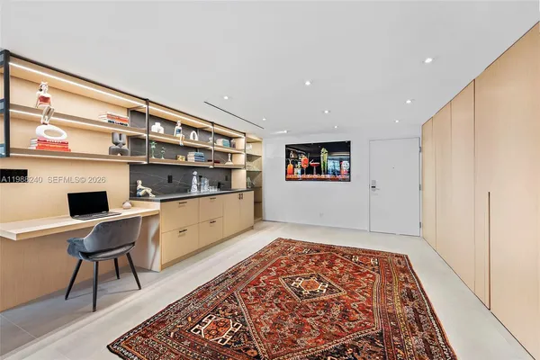 a room with furniture and a chandelier