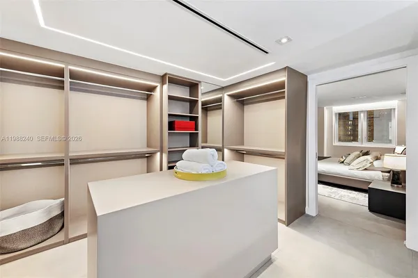 a bed room with a bed and a couch