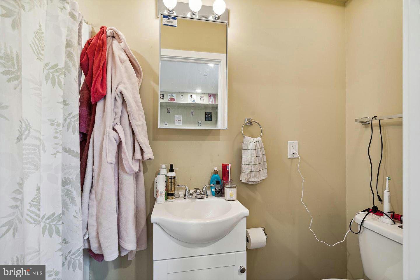 2214 North Camac Street, Unit B Philadelphia, PA 19133 - Photo 17 of 20 a bathroom with a sink toilet and shower
