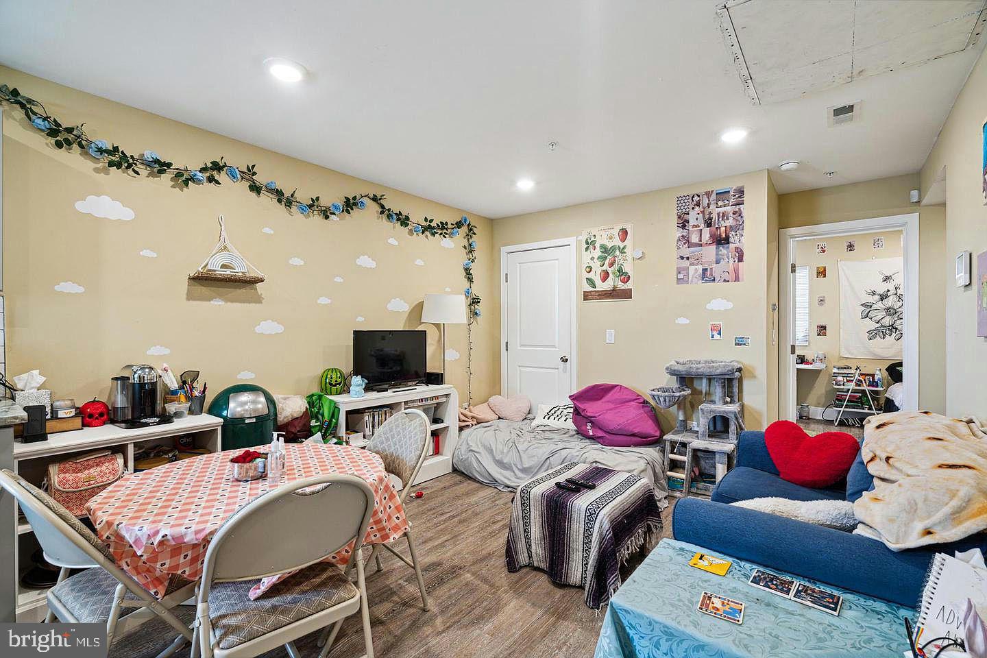 2214 North Camac Street, Unit B Philadelphia, PA 19133 - Photo 5 of 20 a living room with furniture and wooden floor