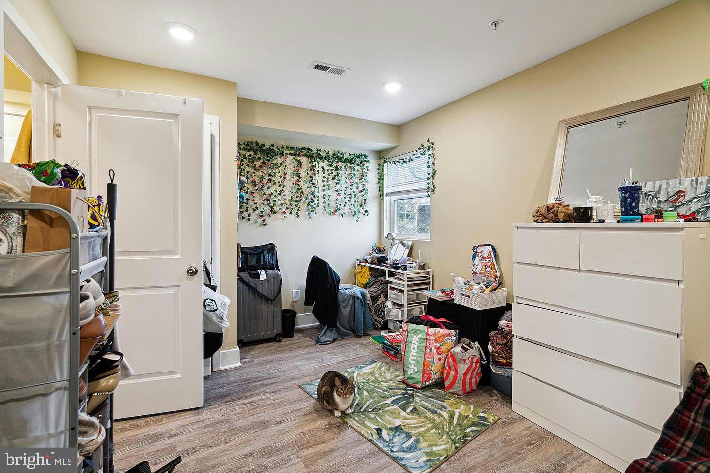 2214 North Camac Street, Unit B Philadelphia, PA 19133 - Photo 8 of 20 a living room with furniture and a fireplace