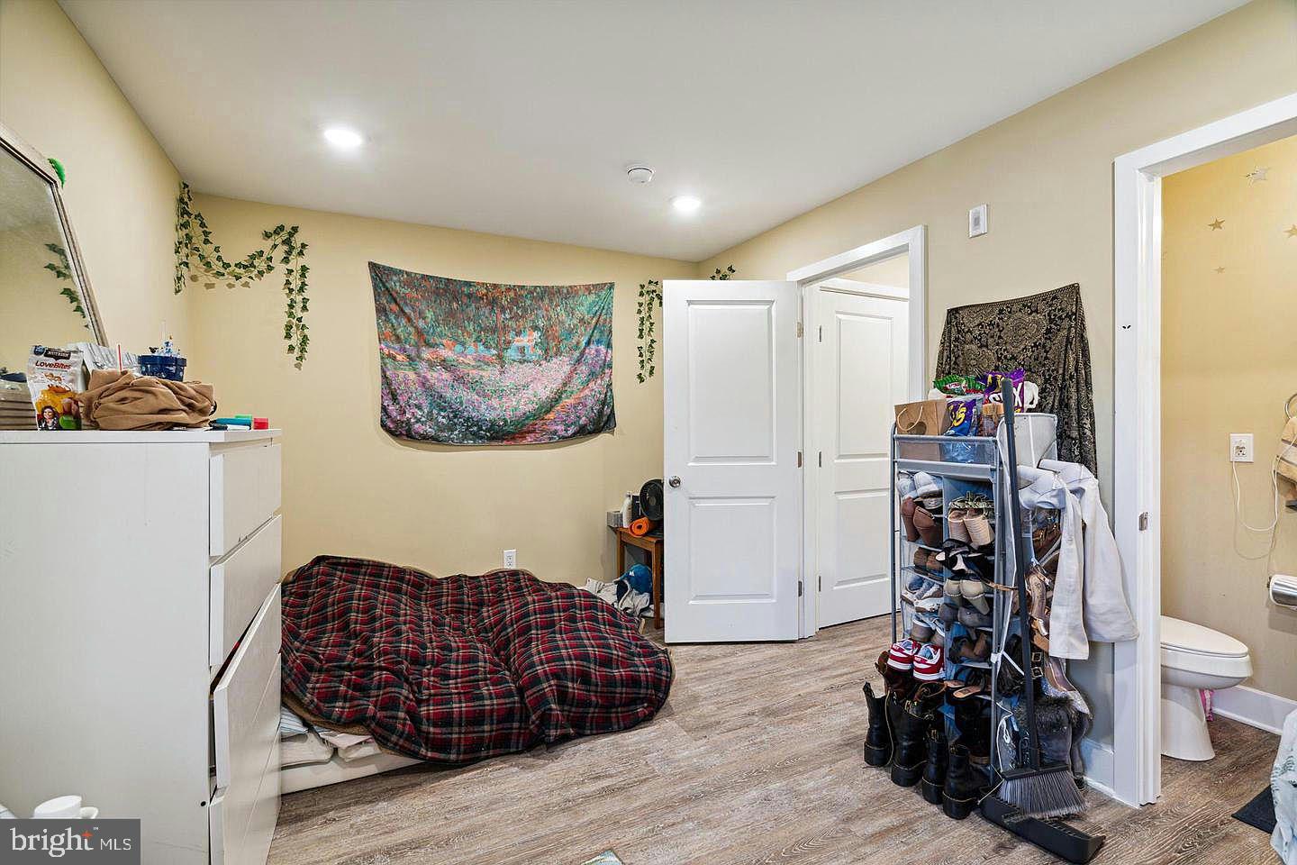 2214 North Camac Street, Unit B Philadelphia, PA 19133 - Photo 9 of 20 a living room with furniture and a flat screen tv