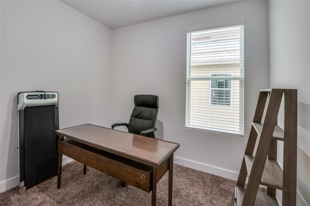 2325 Budd Street Dallas, TX 75215 - Photo 5 of 12 a view of a workspace with furniture and a window