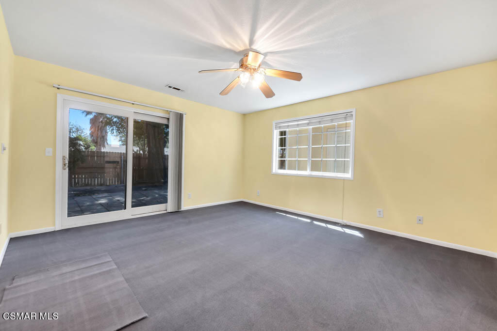 2039 Madrone Street Simi Valley, CA 93065 - Photo 11 of 35 an empty room with windows and ceiling fan