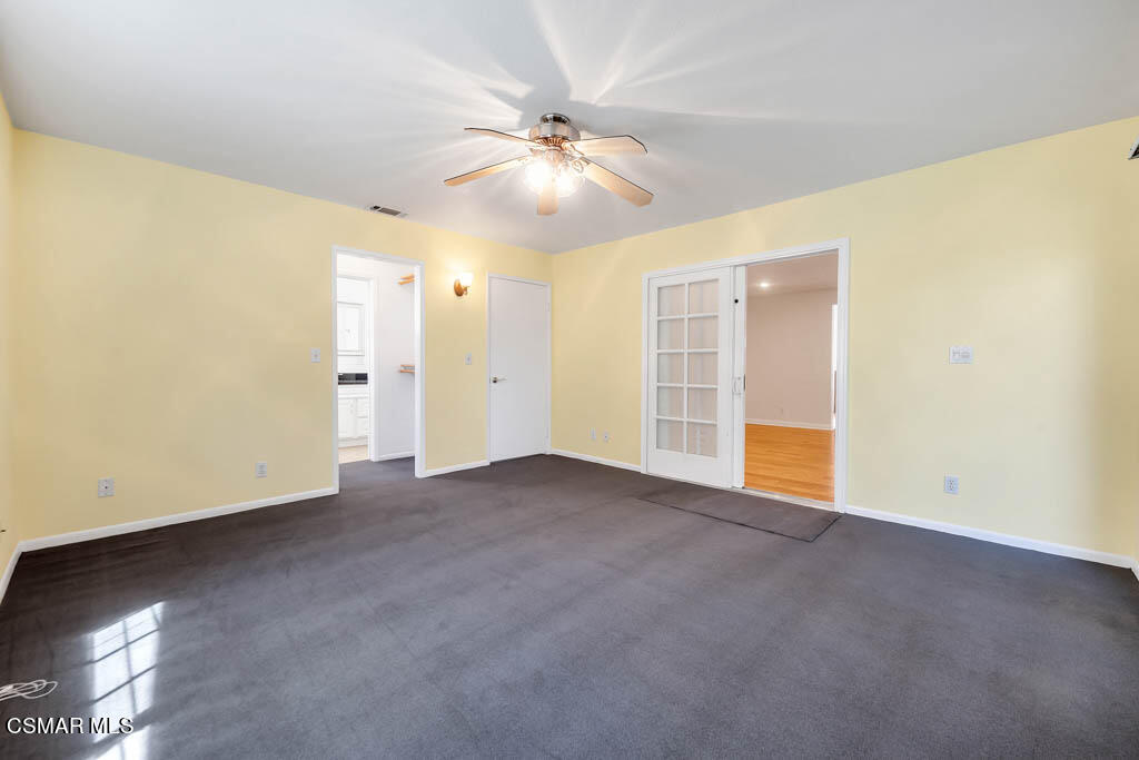 2039 Madrone Street Simi Valley, CA 93065 - Photo 12 of 35 a view of an empty room with a ceiling fan