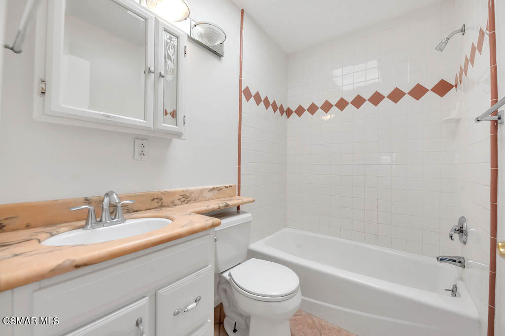 2039 Madrone Street Simi Valley, CA 93065 - Photo 21 of 35 a bathroom with a sink a toilet and a bathtub