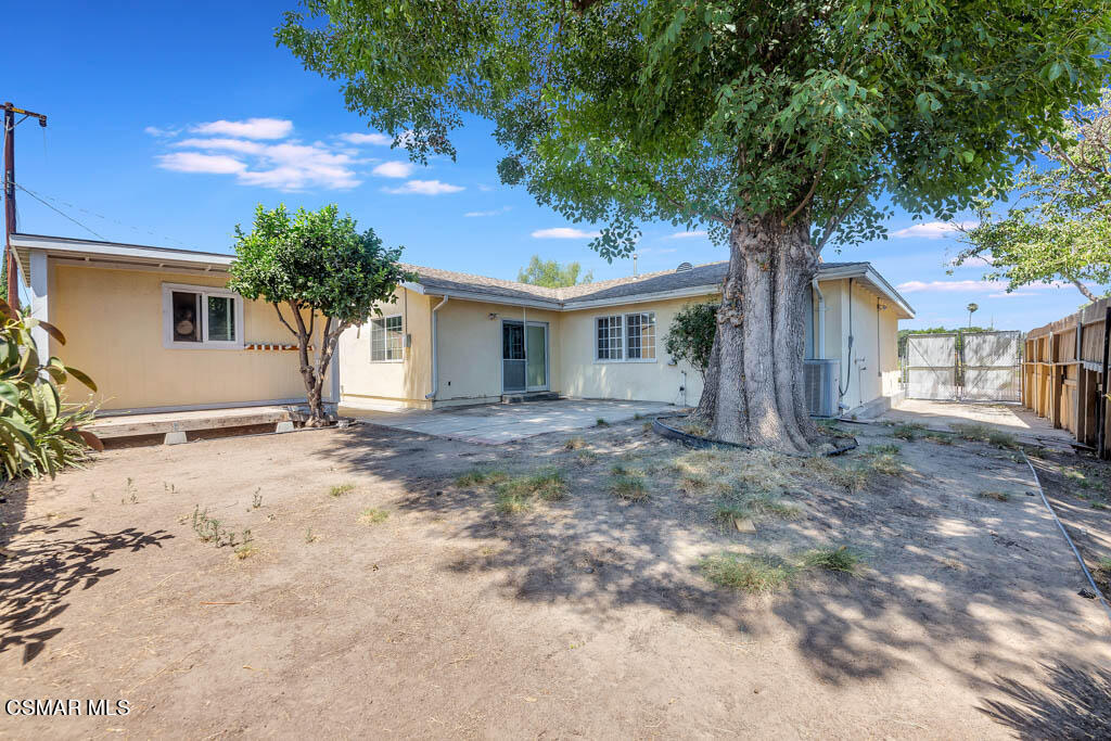 2039 Madrone Street Simi Valley, CA 93065 - Photo 25 of 35 a front view of a house with a yard and trees