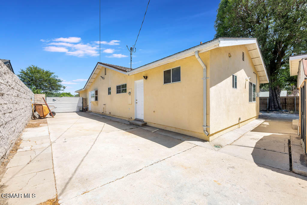 2039 Madrone Street Simi Valley, CA 93065 - Photo 26 of 35 a view of a house with a backyard