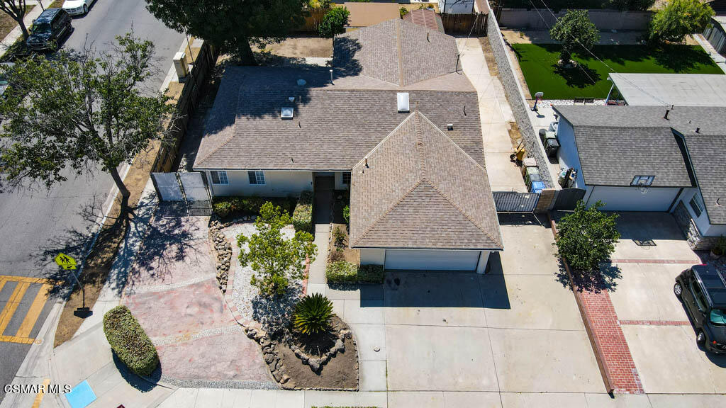2039 Madrone Street Simi Valley, CA 93065 - Photo 32 of 35 an aerial view of a house with a yard and potted plants