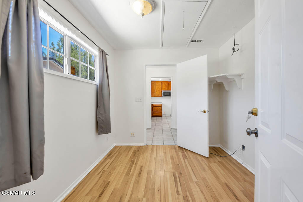 2039 Madrone Street Simi Valley, CA 93065 - Photo 10 of 35 a view of hallway with wooden floor
