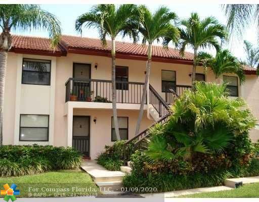 22064 Palms Way, Unit 2040 Boca Raton, FL 33433 - Photo 1 of 8 Exterior Front