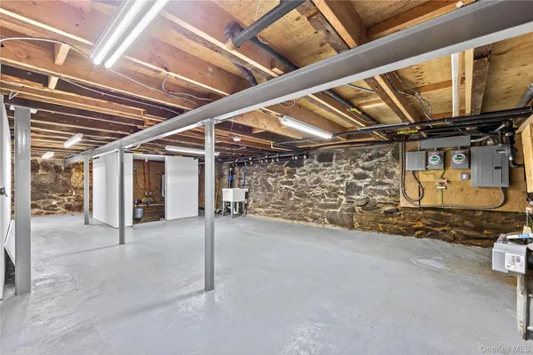 a view of a room with wooden walls