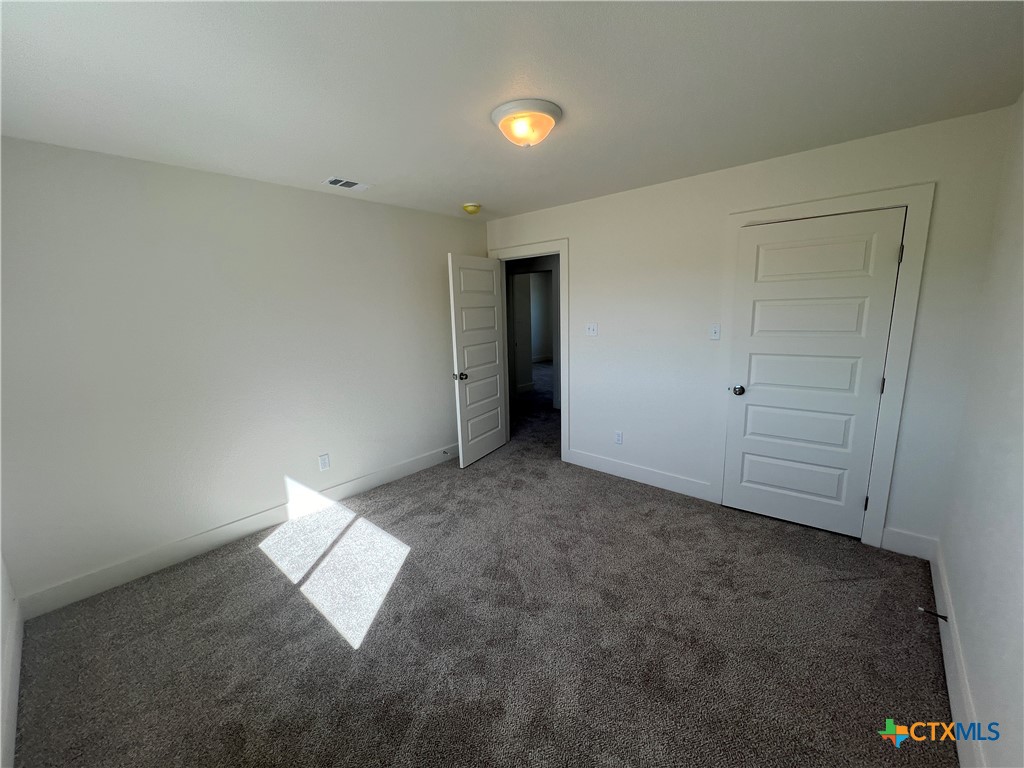 1814 Royal Loop Belton, TX 76513 - Photo 13 of 15 a view of an empty room