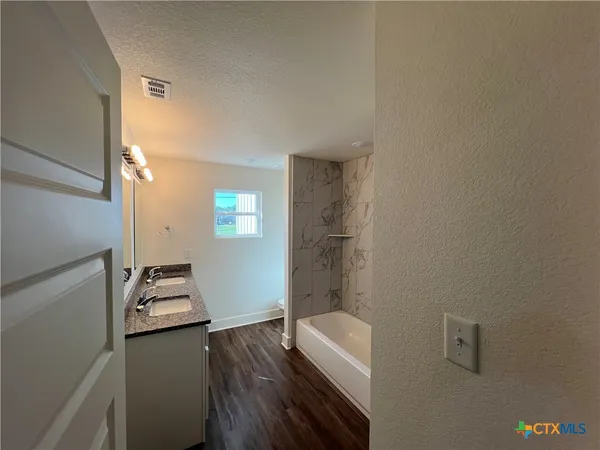 a room with furniture and a window