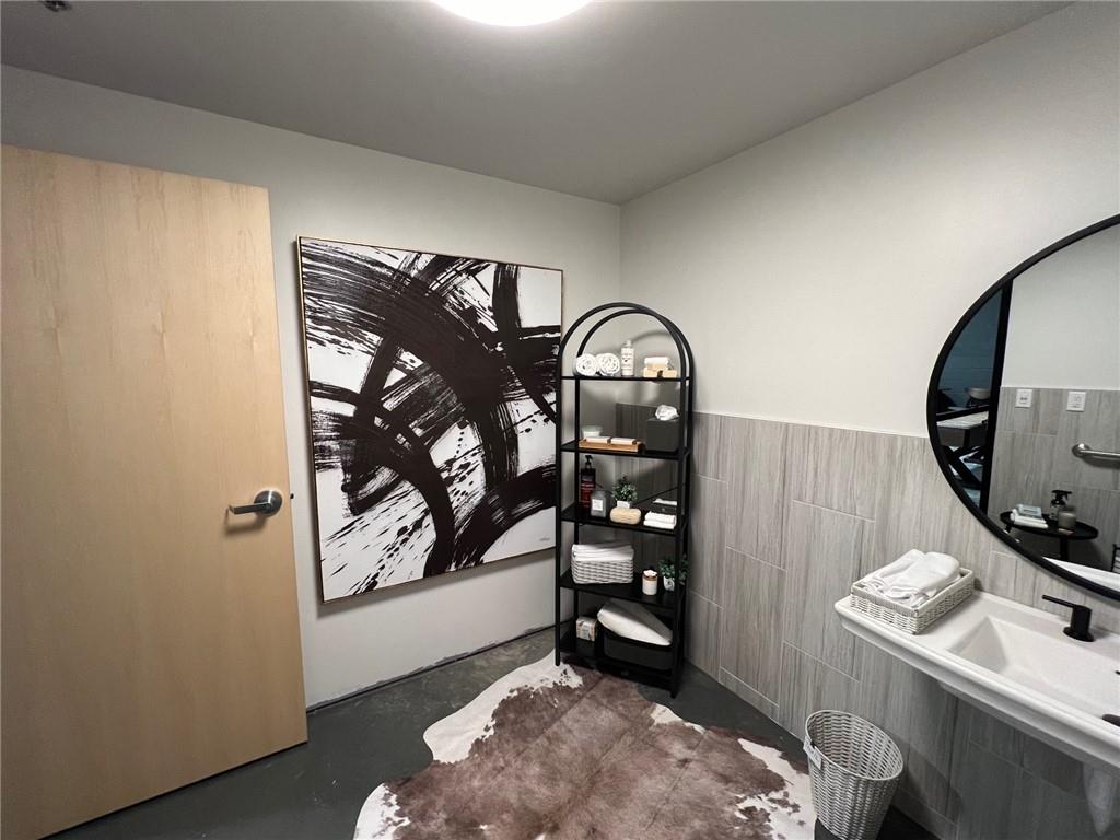 5725 Stables Way, Unit 308 Alpharetta, GA 30004 - Photo 7 of 7 a view of an entryway with wooden floor