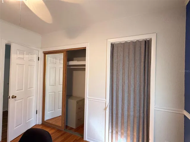 a view of livingroom with furniture and wooden floor
