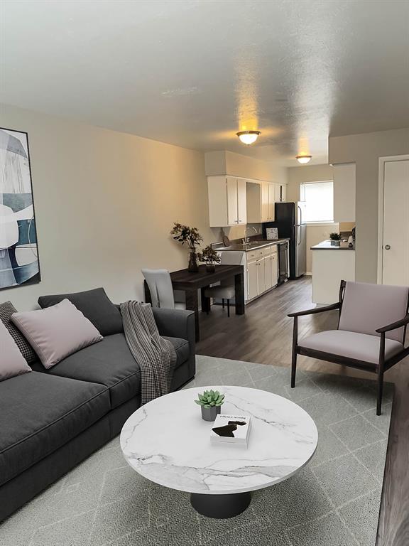 4606 Monarch Street, Unit 109 Dallas, TX 75204 - Photo 1 of 17 Living room with light wood-style flooring
