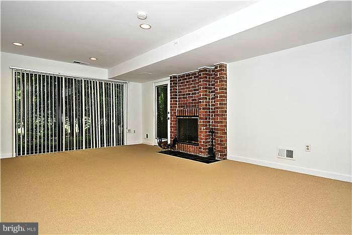 11711 Indian Ridge Road Reston, VA 20191 - Photo 15 of 30 Huge Family Room w FP New Paint and Carpeting