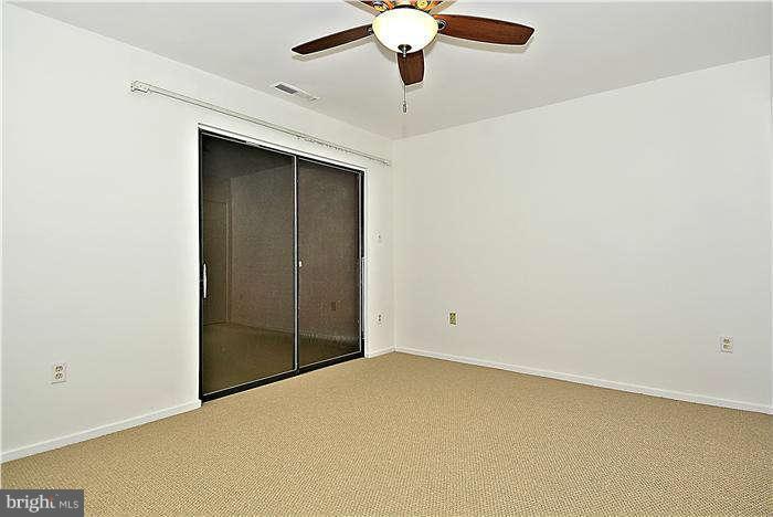 11711 Indian Ridge Road Reston, VA 20191 - Photo 17 of 30 Lower Lvl Bedroom with New Paint and Carpet